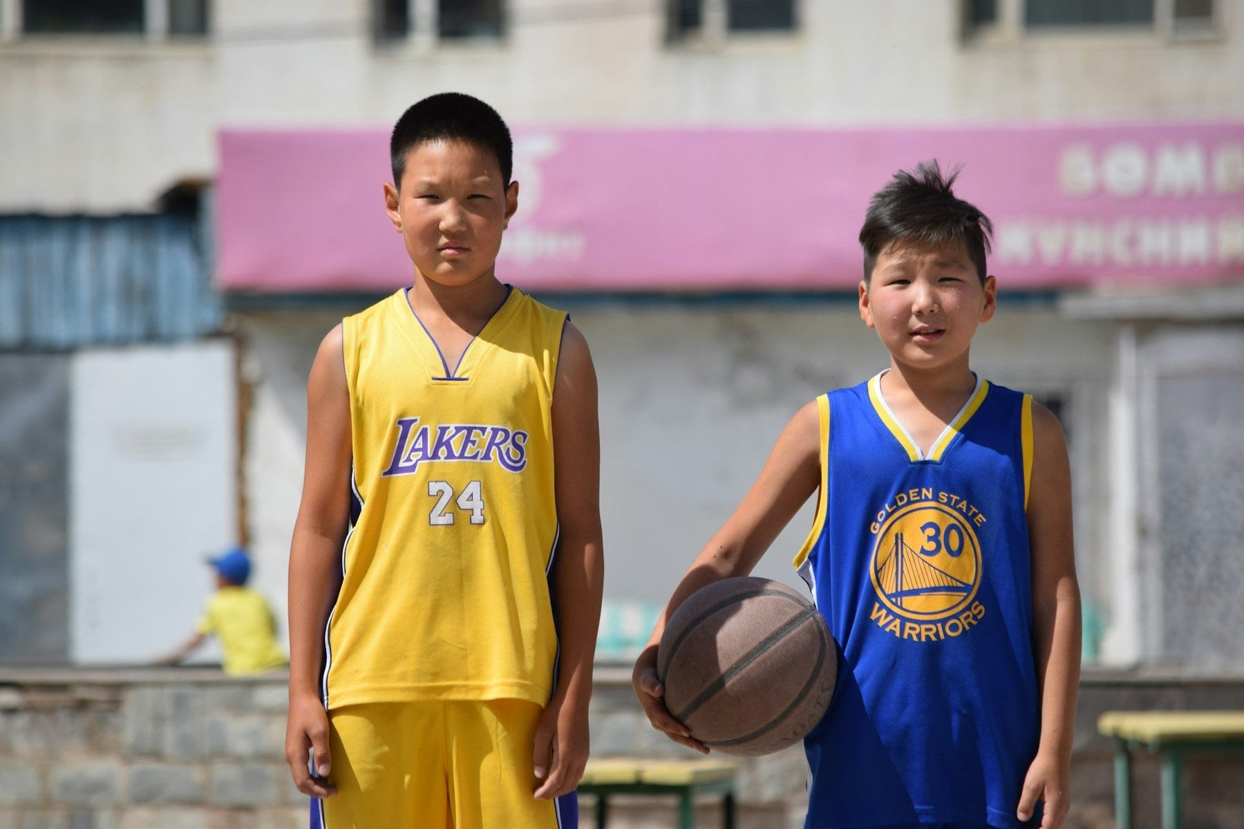 kids wearing basketball jerseys