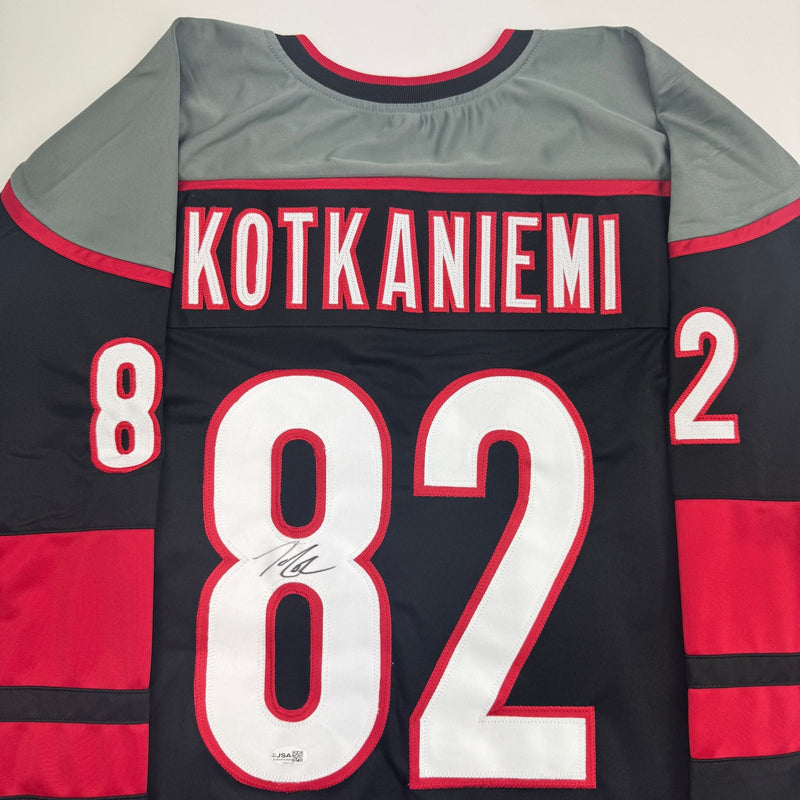 Autographed/Signed Jesperi Kotkaniemi Carolina Black Hockey Jersey Beckett BAS COA