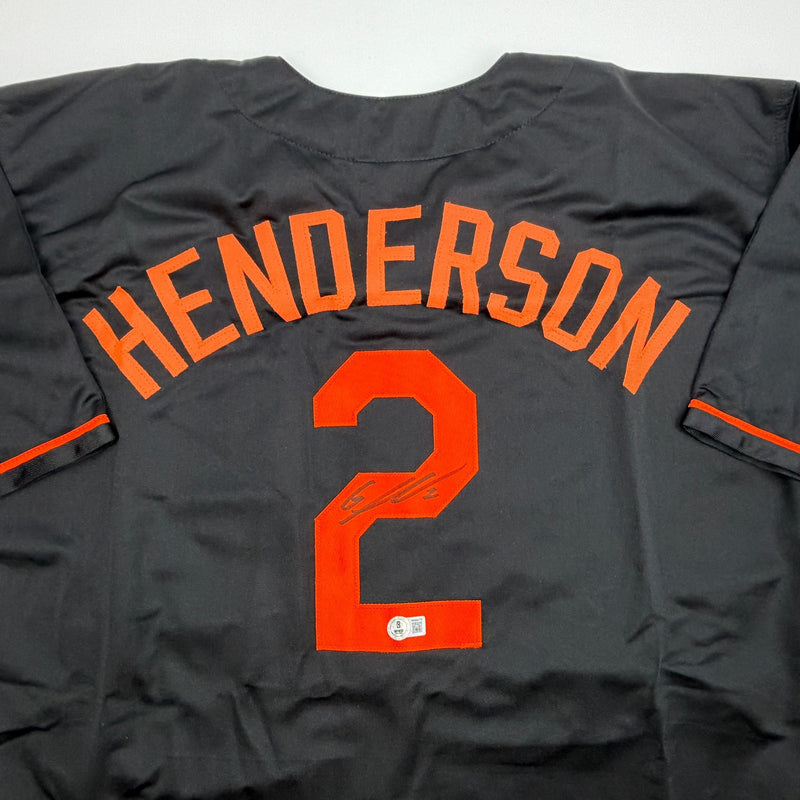 Autographed/Signed Gunnar Henderson Baltimore Black Baseball Jersey Beckett BAS COA