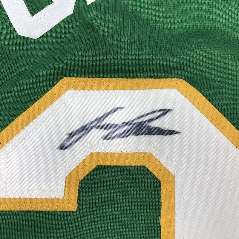Autographed/Signed Jose Canseco Oakland Green Baseball Jersey JSA COA