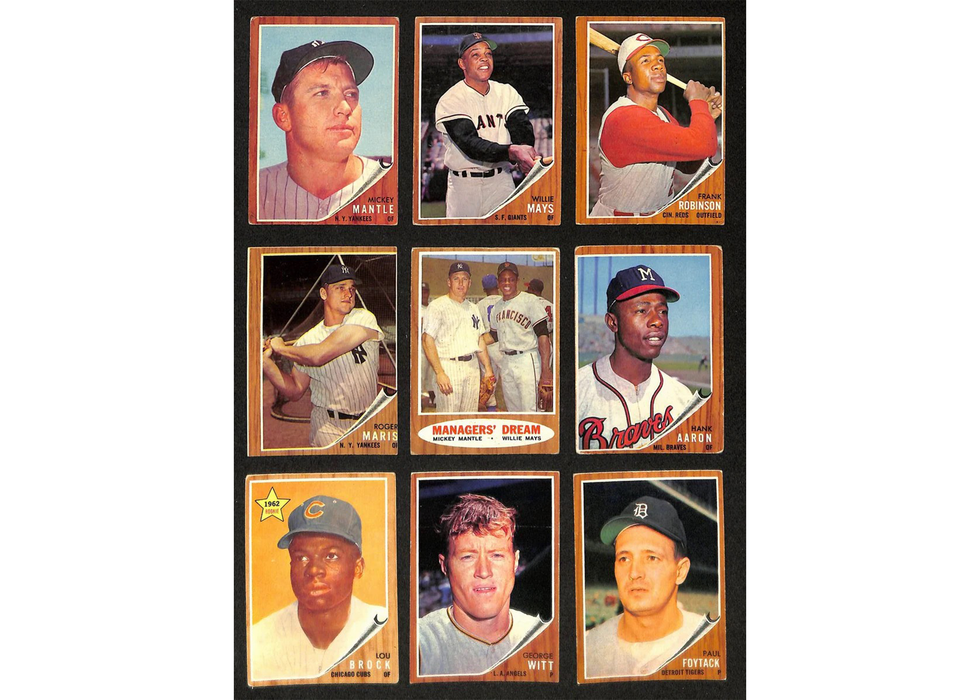 Collection of vintage baseball trading cards featuring different players.
