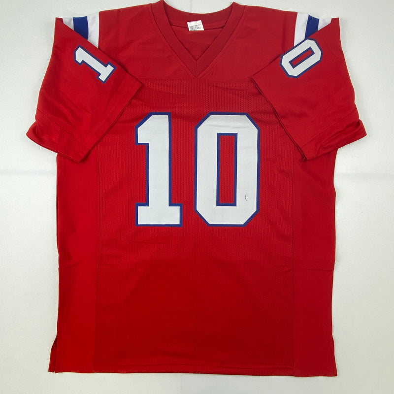 Autographed/Signed Mac Jones New England Red Football Jersey Beckett BAS COA