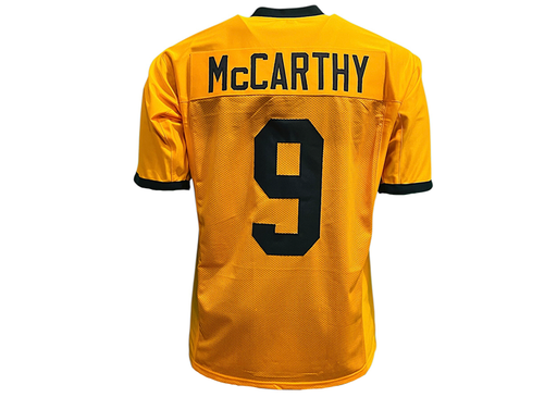 Yellow sports jersey with 'McCarthy' and number '9' on a white background