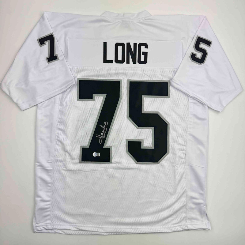 Autographed/Signed Howie Long Oakland White Football Jersey Beckett BAS COA