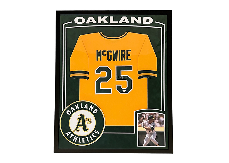 Mark McGwire Signed 35x42 Framed Oakland Gold Baseball Jersey (JSA)