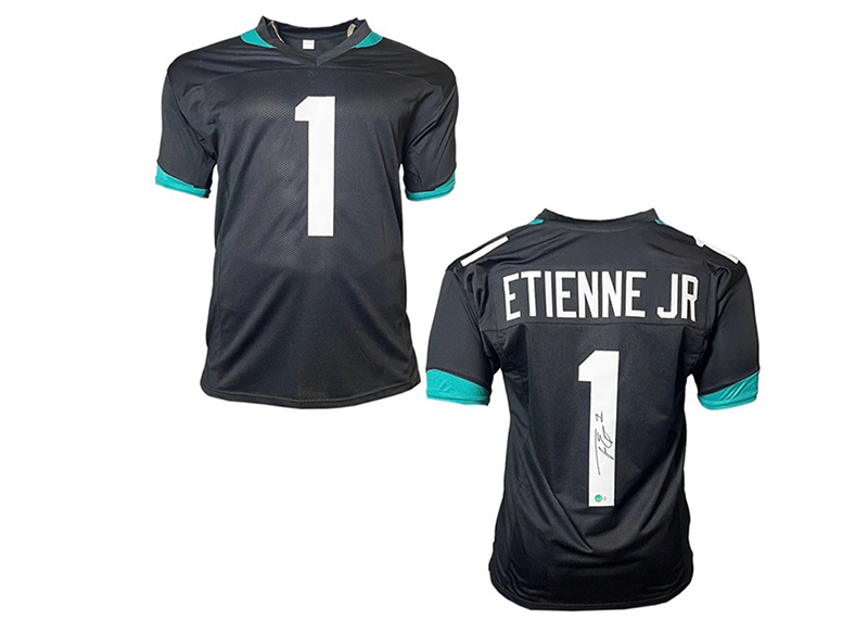 Travis Etienne Signed Jacksonville Black Football Jersey (Beckett)
