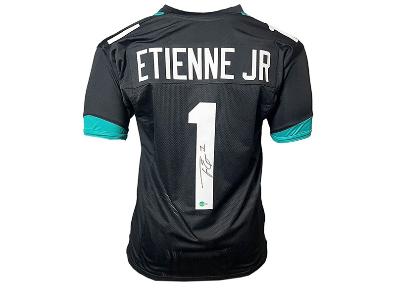 Travis Etienne Signed Jacksonville Black Football Jersey (Beckett)